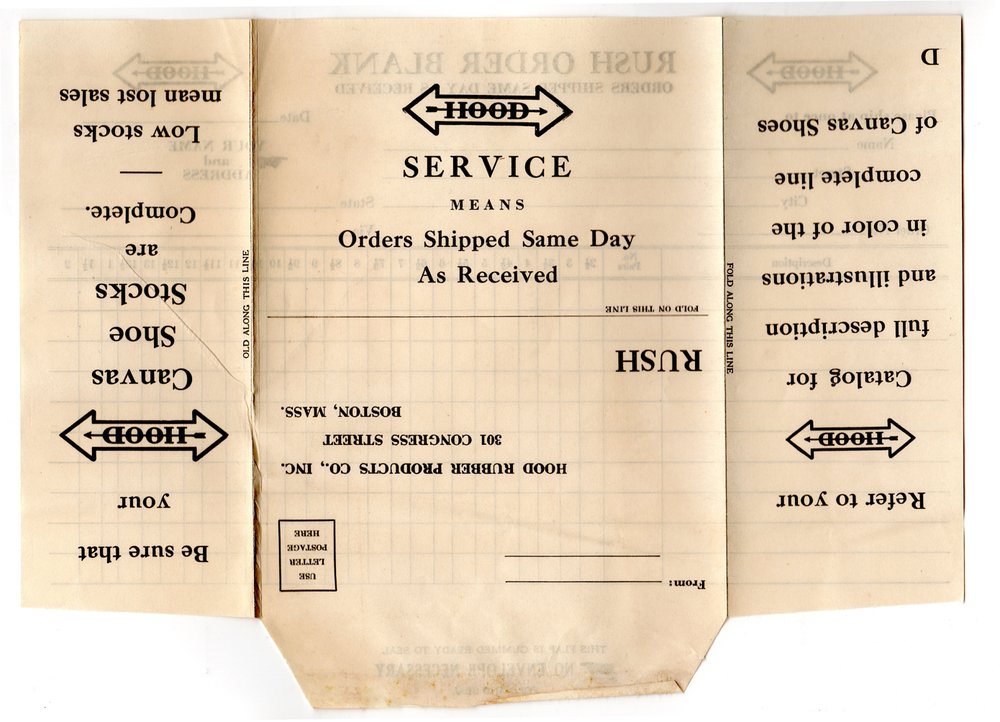 A Hood rush order envelope printed with the double-headed Hood arrow