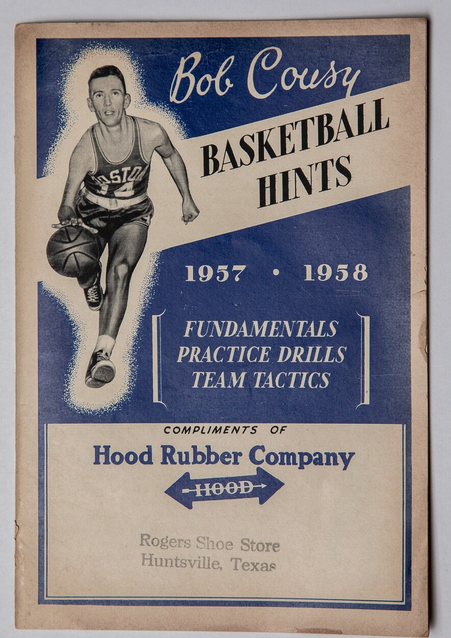 Cover of Bob Cousy Basketball Hints for 1957 and 1958, printed in blue, compliments of Hood Rubber Company, stamped Rogers Shoe Store, Huntsville, Texas.