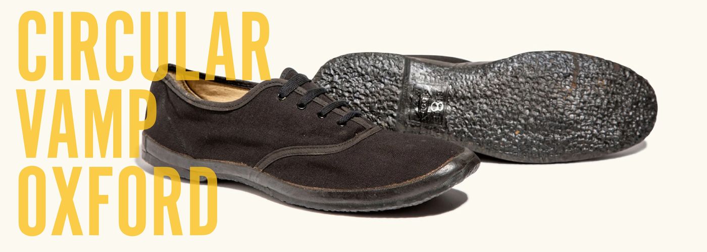 The Hood circular vamp oxford spread from Canvas + Rubber: a black canvas oxford with a black rubber foxing beside its upturned pebbled rubber sole, under the words Circular Vamp Oxford